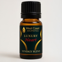 West Coast Aromatics 10 ml Heart Luxury Synergy Blend essential oil bottle – amber glass with black cap, featuring a dark green and gold label with red and gold text